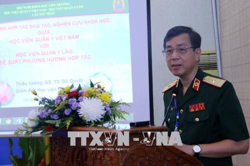  Việt Nam và Lào tăng cường hợp tác trong lĩnh vực quân y ảnh 1